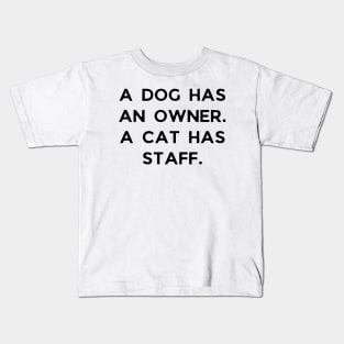 A dog has an owner. A cat has a staff. Kids T-Shirt